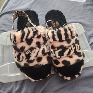 Pink and black ugg slippers